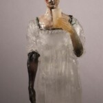 Judy Hill's works combine the craquelure-like glaze effect inherent with raku ceramics with the transparemcy of kilncasted glass. Her works, self portraits, convey feelings of longing, vulnerability and doubt. 
On loan from the collection of Jill Pelisek Judy Hill (American, b.1953), Water Drinker, 1993. Cast glass and ceramics.