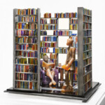 In the modern age, libraries are often seen as both places of social gathering as well as fortresses of solitude and introspection. Influenced by American painter Edward Hopper, artist Lucy Lyon uses body language to articulate an emotion or mood. She takes her inspiration from environments in which figures appear alone, even in the presence of others. 
Gift of Jeffrey Stevens Lucy Lyon (American, b.1947), Summer Afternoon, Private Library, 1998. Cast glass, plate glass, steel and powder coated aluminum.